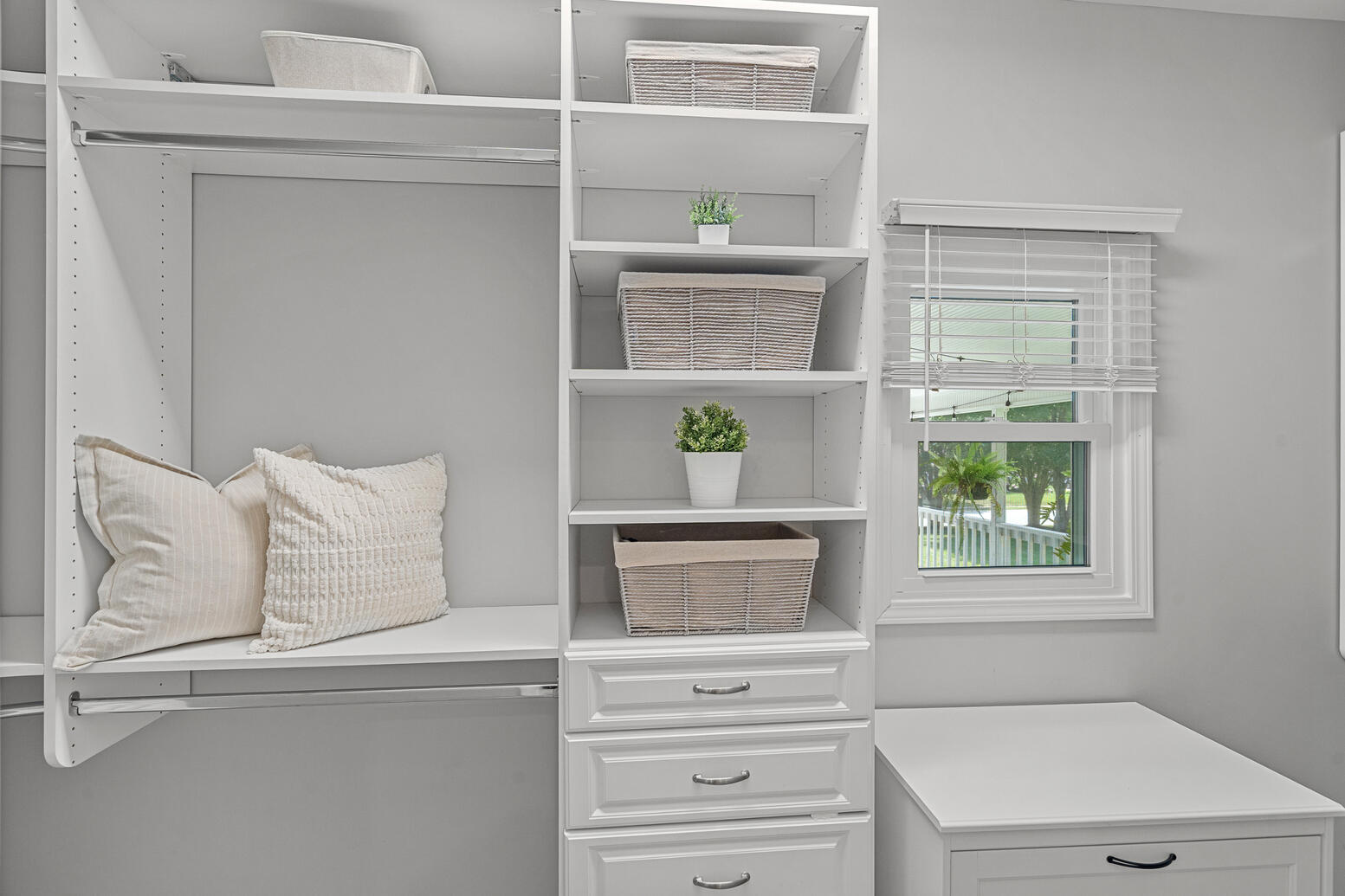 Walk‑in custom closet at 8948 Devonshire Drive Huntersville NC with built‑in shelves and organizers.