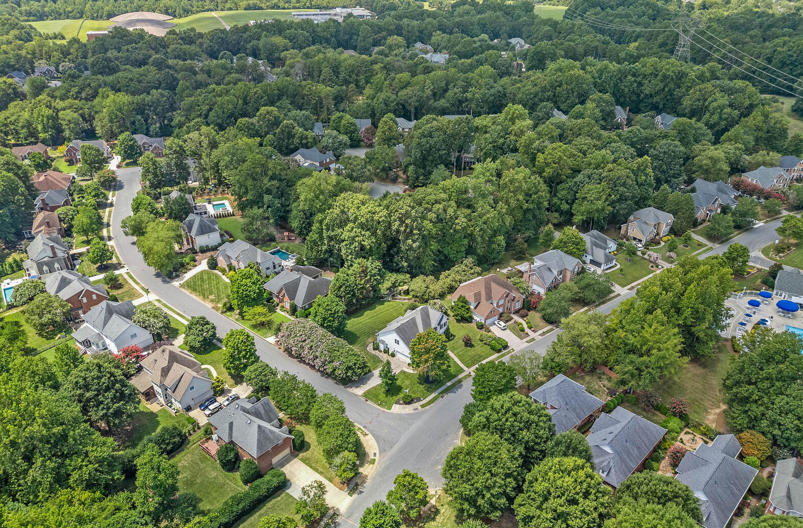 Birkdale neighborhood in Huntersville NC with swim team, golf course, and nearby shopping.”