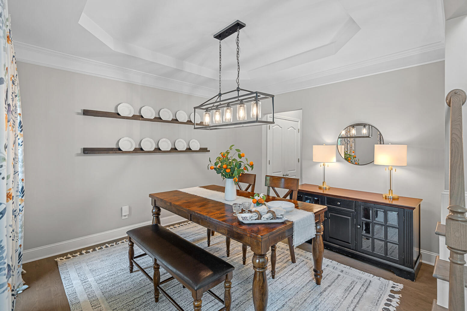 Formal dining room at 8948 Devonshire Drive Huntersville NC with large windows and hardwood floors.