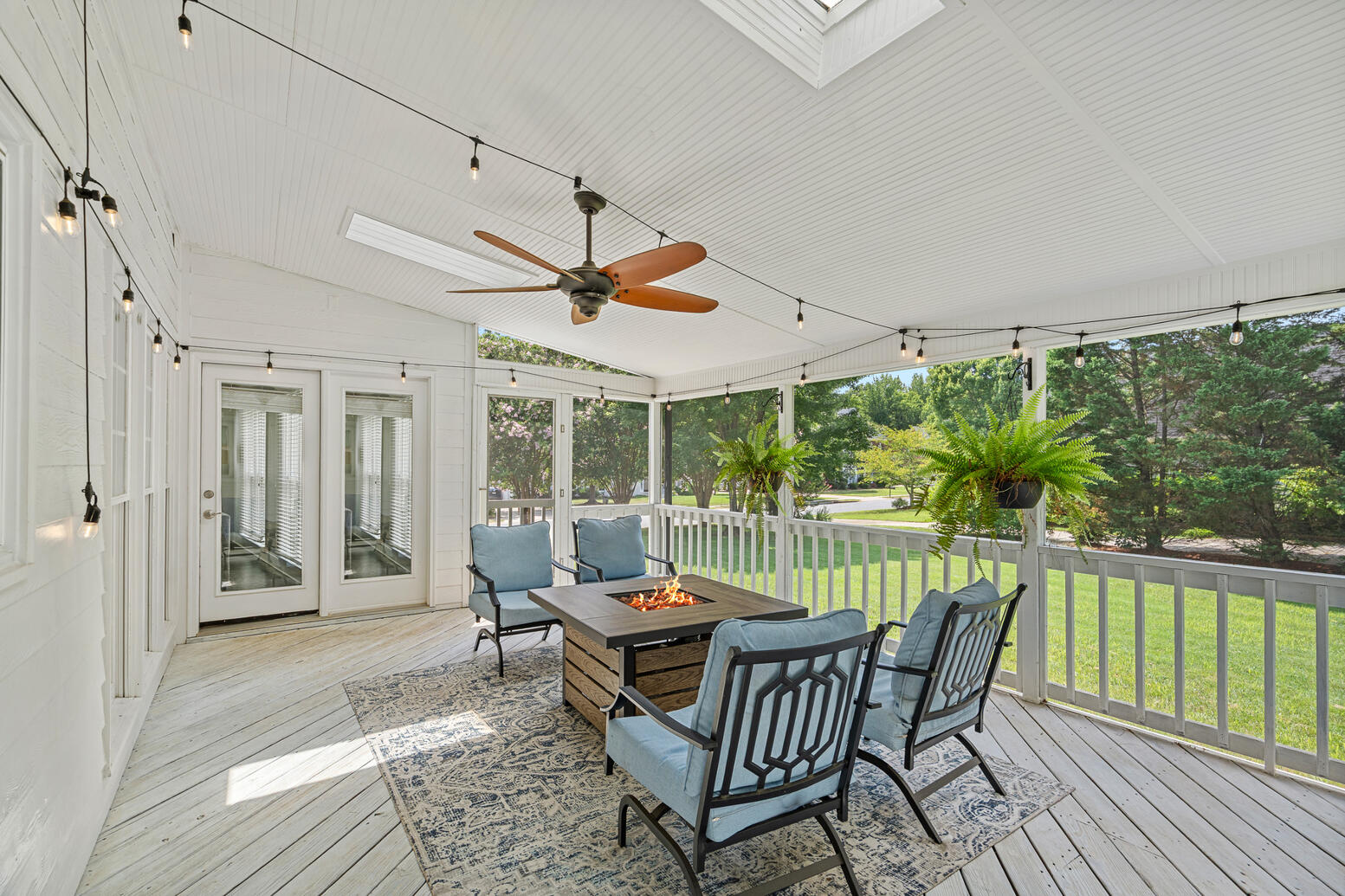 Private backyard at 8948 Devonshire Drive Huntersville NC with patio and mature landscaping.