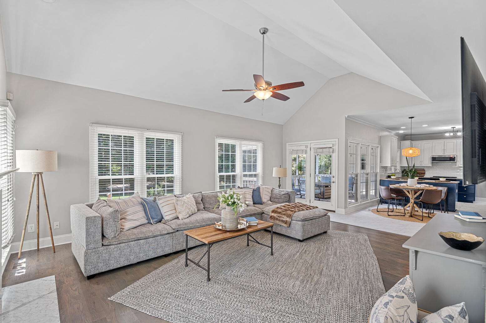 Spacious living room with natural light and hardwood floors at 8948 Devonshire Drive Huntersville NC.